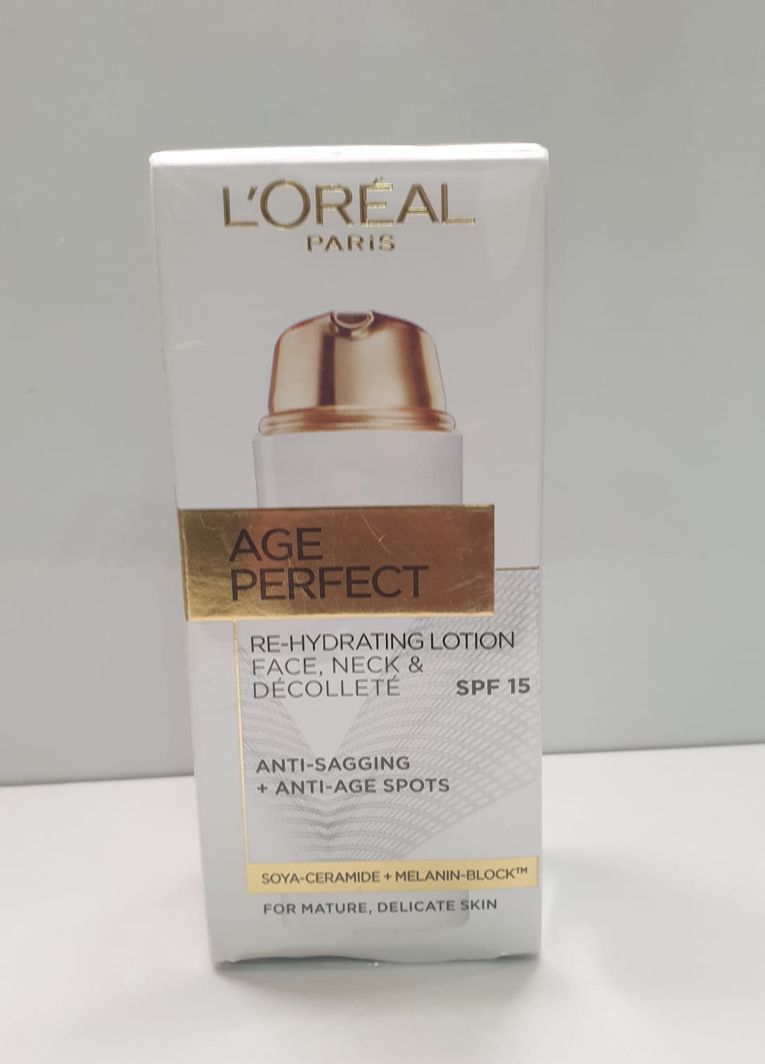 L’Oréal Paris Age Perfect Re-Hydrating Lotion SPF 15 – For Face, Neck & Décolleté